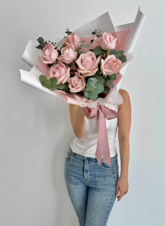Pink roses bouquet with eucalyptus