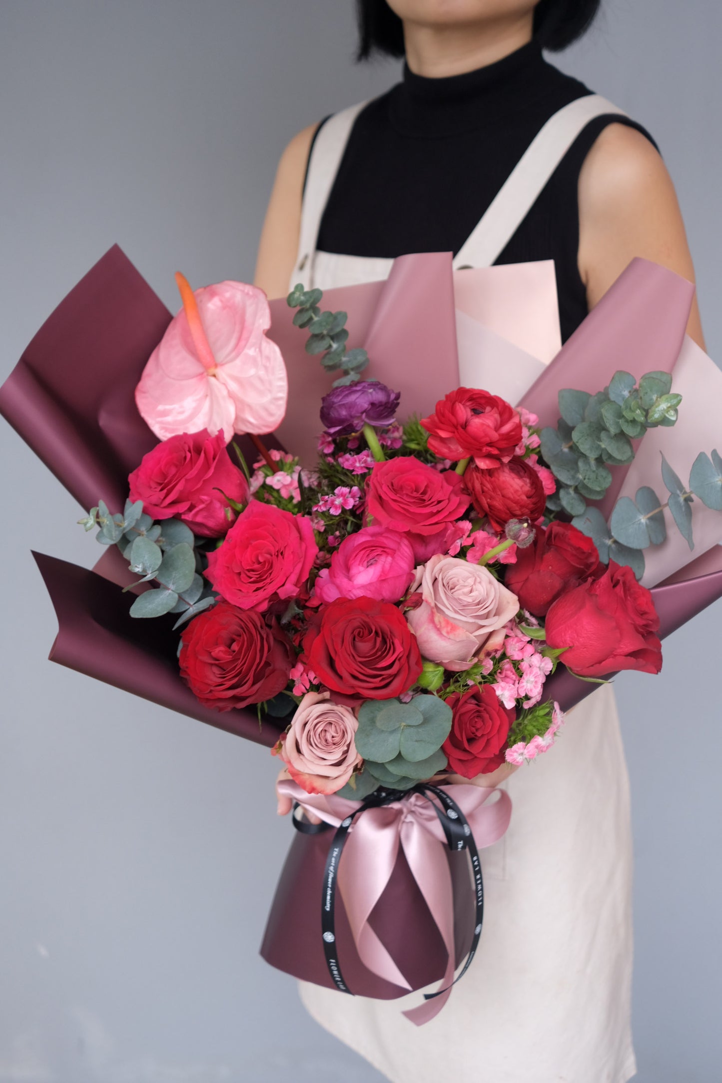 Fresh flower bouquet in shades of red