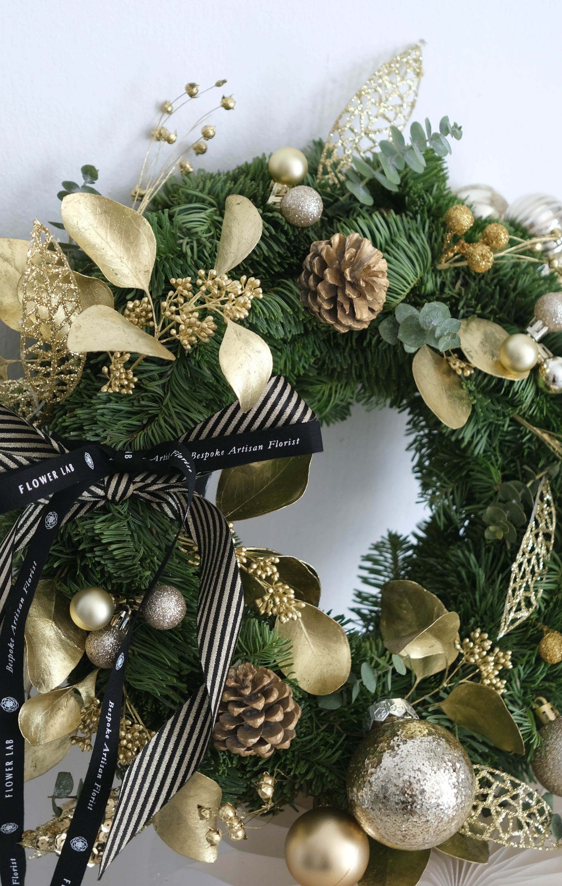 Flower Lab Singapore Christmas wreath with gold ornaments 