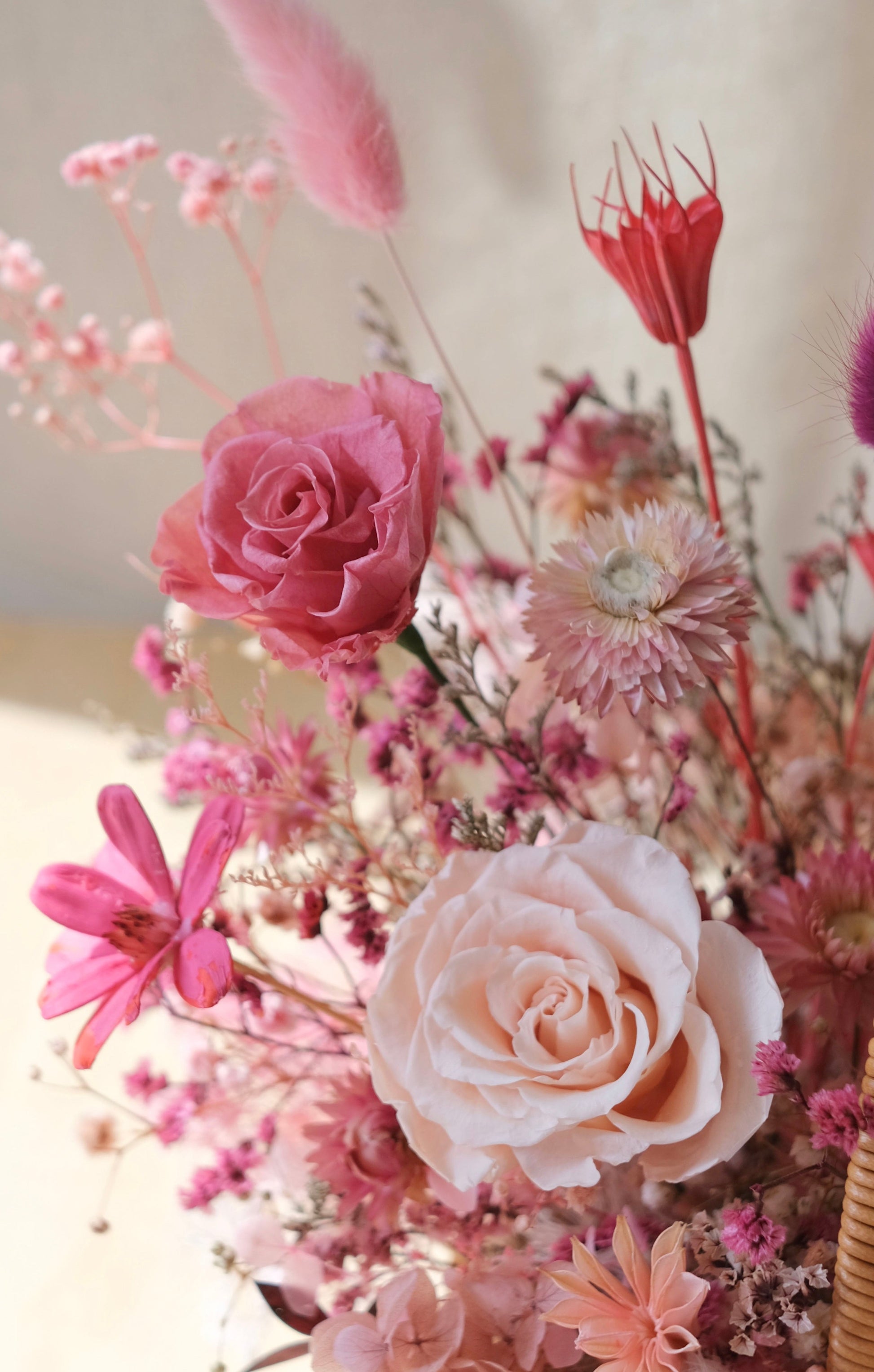 Preserved floral basket with roses pink and red