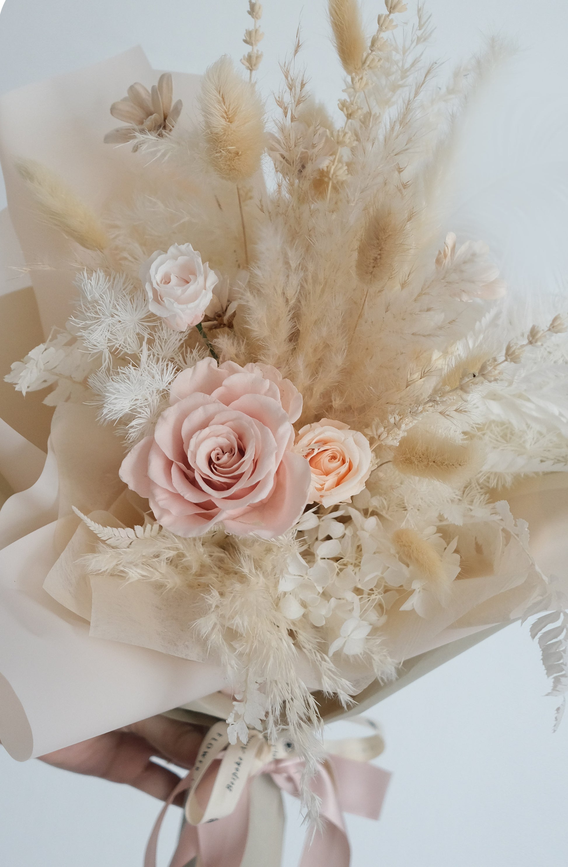 Preserved and dried bouquet Blush roses pampas closeup