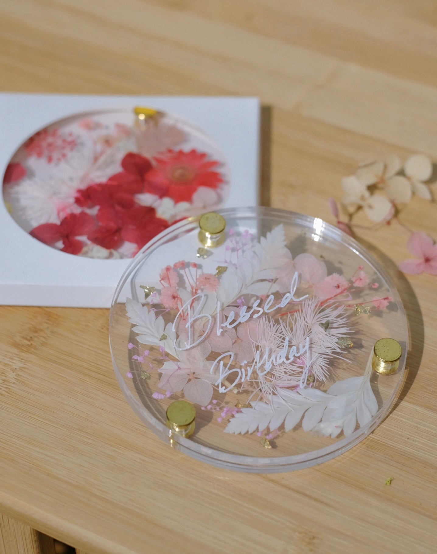 Decorative round floral acrylic coaster with flowers and personalized text